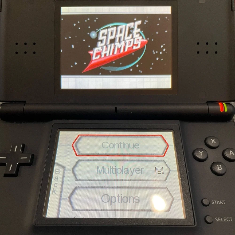 Nintendo DS Lite- excellent condition - comes with 13 games +